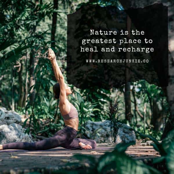 A woman stretching in nature. From Mind to Body: How to Embrace a Holistic Lifestyle