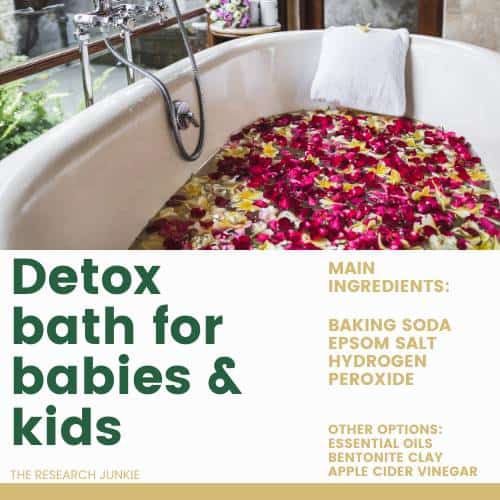 A white bath tub filled with dried flower petals. A detox bath for babies and kids